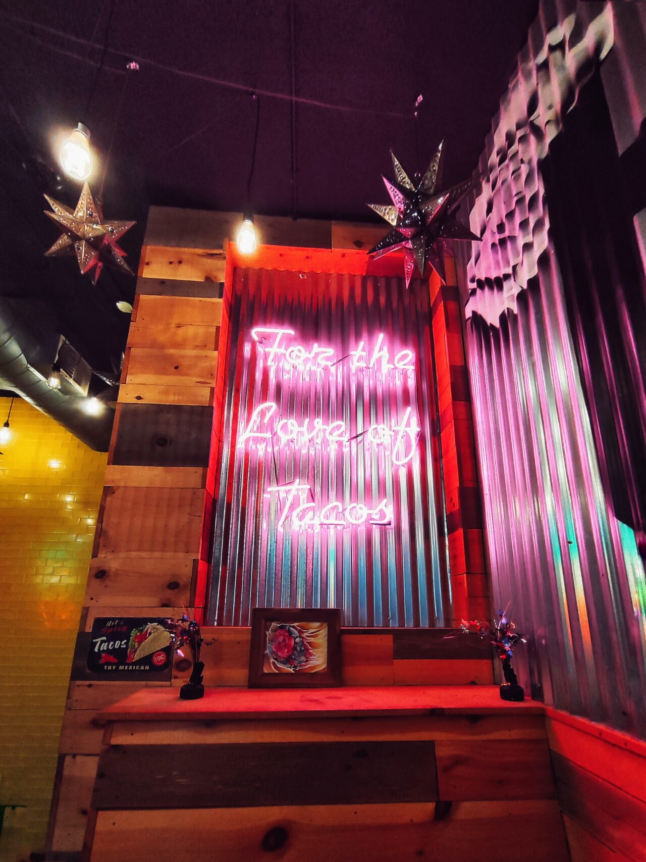 Neon sign: “For the Love of tacos”