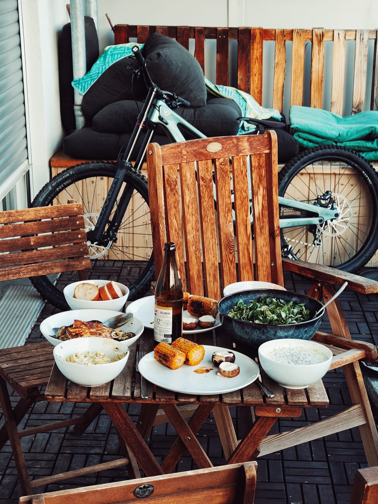 BBQ on baloney with mountain bike in background