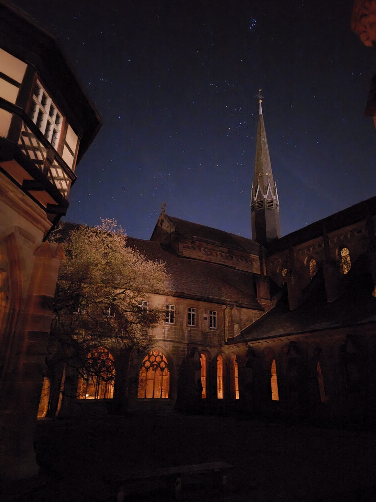 Cloister at night with stars above