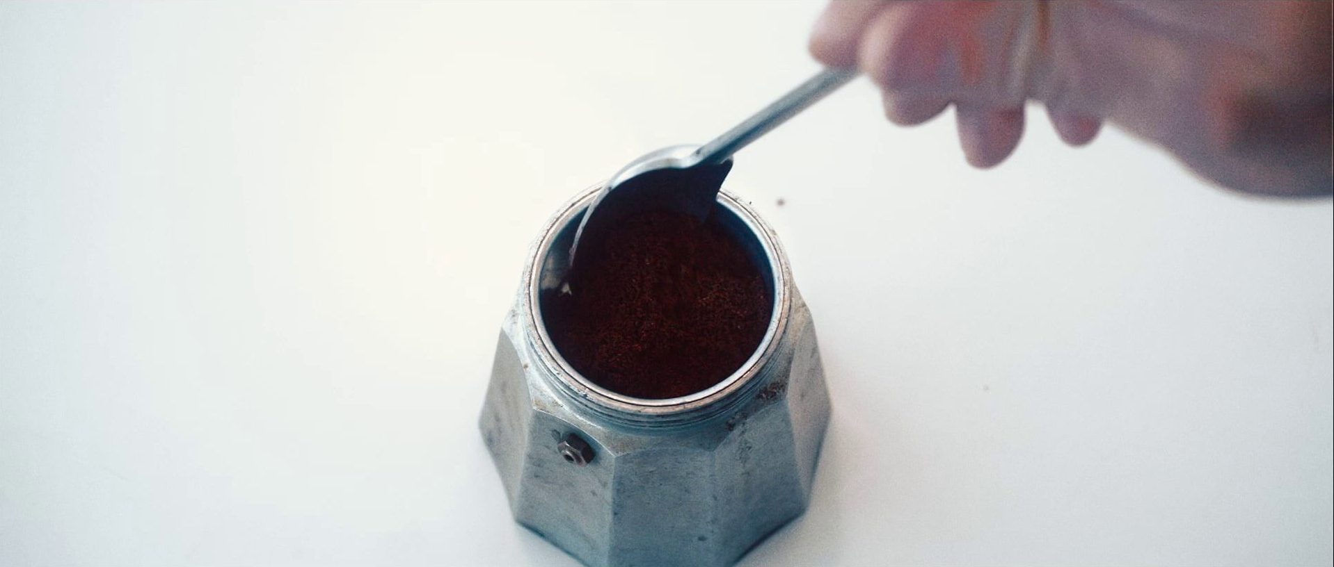 Mokkapot being filled with coffee